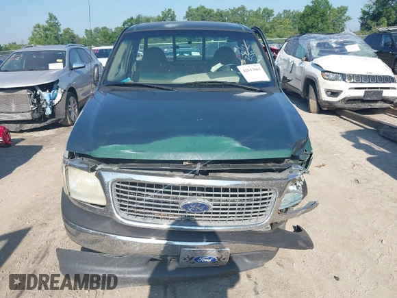 2000 Ford F-150 XL with VIN 1FTZF1720YNB20382, listed as a IAAI auction lot 42613663 with Not provided miles and . Bid and sale history available at DreamBid. Image 12.