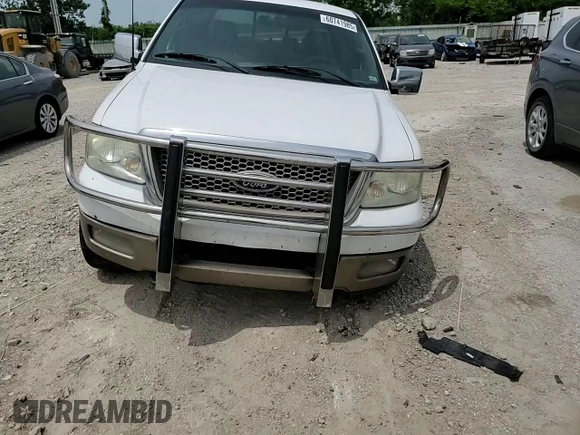 2004 Ford F-150 XLT with VIN 1FTPW14554KC27784, listed as a Copart auction lot 60741985 with 3,163 mi miles and Salvage title. Bid and sale history available at DreamBid. Image 13.