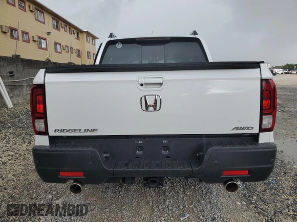 2023 Honda Ridgeline RTL-E with VIN 5FPYK3F76PB064582, listed as a Copart auction lot 63629375 with 11,940 mi miles and Salvage title. Bid and sale history available at DreamBid. Image 6.
