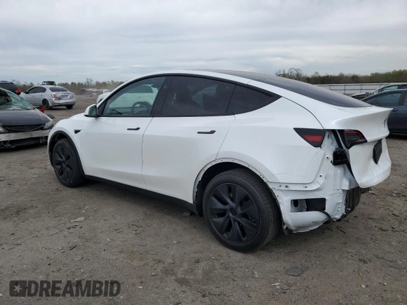 2025 Tesla Model Y Long Range with VIN 7SAYGDED5SF241318, listed as a Copart auction lot 51614245 with 3,682 mi miles and Salvage Title. Bid and sale history available at DreamBid. Image 2.
