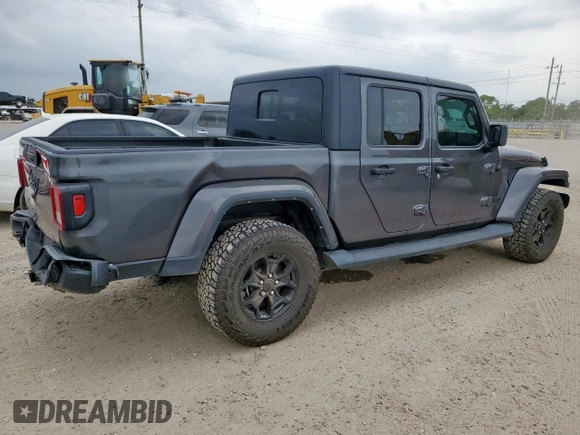 2021 Jeep Gladiator Willys с VIN 1C6HJTAG9ML606731, выставлен на аукционе Copart как лот 59873205 с пробегом 84 811 миль миль и Списание • Salvage title. История ставок и продаж доступна на DreamBid. Изображение 3.