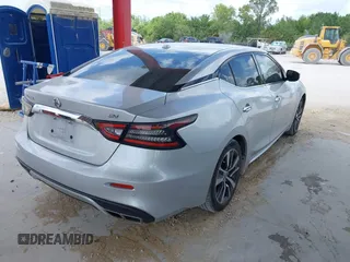 2020 Nissan Maxima SV z VIN 1N4AA6CV6LC366887, wystawiony jako IAAI lot #41952159 z przebiegiem 100 182 mil mil oraz . Historia ofert i sprzedaży dostępna na DreamBid. Obrazek 4.