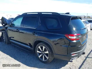 2023 Honda Pilot Elite with VIN 5FNYG1H80PB007959, listed as a IAAI auction lot 41677282 with 28,892 mi miles. Bid and sale history available at carsss.com. Image 3.