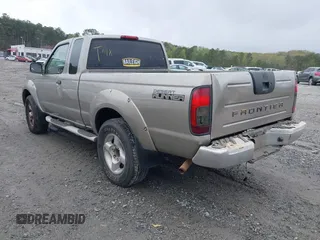 2001 Nissan Frontier SE Desert Runner with VIN 1N6ED26T91C346200, listed as a IAAI auction lot 41914616 with 236,612 mi miles and . Bid and sale history available at DreamBid. Image 3.