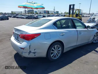 2015 Infiniti Q50 Premium with VIN JN1BV7AP8FM339334, listed as a IAAI auction lot 41956950 with 99,945 mi miles. Bid and sale history available at carsss.com. Image 4.