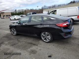 2018 Honda Clarity Touring z VIN JHMZC5F31JC007583, wystawiony jako Copart lot #53308235 z przebiegiem 117 234 mil mil oraz Szkoda całkowita • Salvage title. Historia ofert i sprzedaży dostępna na DreamBid. Obrazek 2.