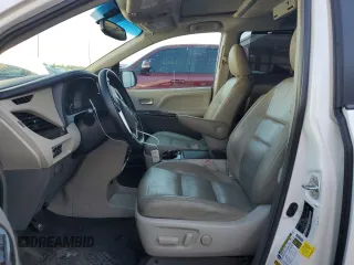 2015 Toyota Sienna XLE with VIN 5TDYK3DC0FS679812, listed as a Copart auction lot 61600775 with 118,483 mi miles and Salvage title. Bid and sale history available at DreamBid. Image 7.