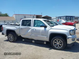 2017 GMC Sierra 1500 SLT z VIN 3GTU2NEC9HG506851, wystawiony jako IAAI lot #42160982 z przebiegiem 188 220 mil mil oraz . Historia ofert i sprzedaży dostępna na DreamBid. Obrazek 13.