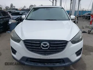2016 Mazda CX-5 Grand Touring with VIN JM3KE4DY7G0737232, listed as a IAAI auction lot 42158279 with Not Provided miles and . Bid and sale history available at DreamBid. Image 12.