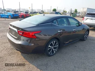 2016 Nissan Maxima SV with VIN 1N4AA6AP9GC384035, listed as a IAAI auction lot 42856838 with 116,736 mi miles and . Bid and sale history available at DreamBid. Image 4.