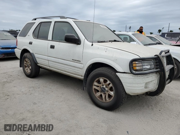 2002 Isuzu Rodeo S with VIN 4S2DM58W324327147, listed as a Copart auction lot 75194104 with Not Provided miles and Salvage Title. Bid and sale history available at DreamBid. Image 4.