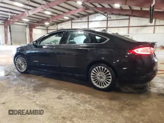 2014 Ford Fusion Titanium Hybrid z VIN 3FA6P0RUXER168706, wystawiony jako Copart lot #55362295 z przebiegiem 136 382 mil mil oraz Czysty tytuł • Clean title. Historia ofert i sprzedaży dostępna na DreamBid. Obrazek 2.