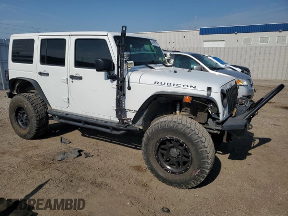 2015 Jeep Wrangler Unlimited Rubicon with VIN 1C4BJWFG1FL750561, listed as a Copart auction lot 60797075 with 95,677 mi miles and Salvage title. Bid and sale history available at DreamBid. Image 4.