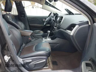 2014 Jeep Cherokee Limited z VIN 1C4PJLDB9EW162416, wystawiony jako IAAI lot #42779797 z przebiegiem 158 581 mil mil oraz . Historia ofert i sprzedaży dostępna na DreamBid. Obrazek 5.