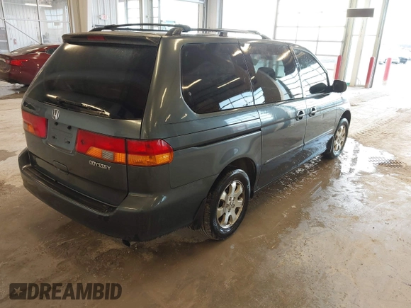 2004 Honda Odyssey EX z VIN 5FNRL18674B050429, wystawiony jako IAAI lot #41655622 z przebiegiem 257 656 mil mil oraz . Historia ofert i sprzedaży dostępna na DreamBid. Obrazek 4.
