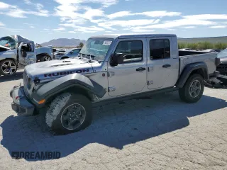 2020 Jeep Gladiator Rubicon with VIN 1C6JJTBG3LL102061, listed as a Copart auction lot 54800225 with 57,481 mi miles and Salvage title. Bid and sale history available at DreamBid. Image 1.