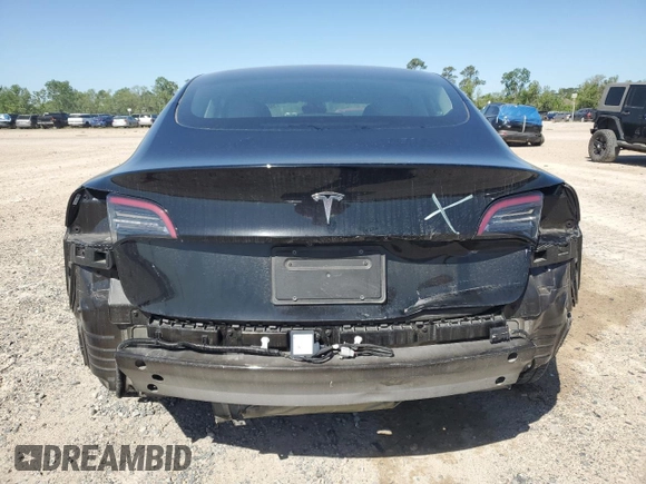 2023 Tesla Model 3 with VIN 5YJ3E1EA1PF456896, listed as a Copart auction lot 50423785 with 49,316 mi miles and Salvage title. Bid and sale history available at DreamBid. Image 6.
