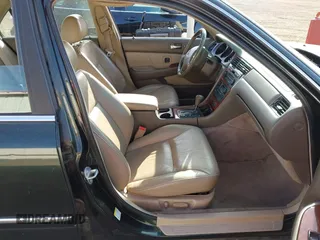 2002 Acura RL with VIN JH4KA96502C010671, listed as a IAAI auction lot 41998263 with 248,336 mi miles. Bid and sale history available at carsss.com. Image 5.