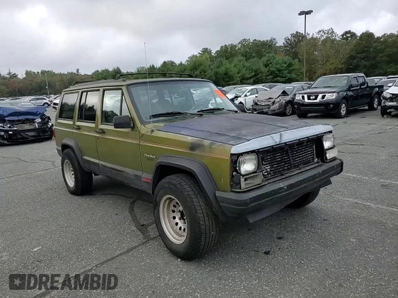 1996 Jeep Cherokee Sport with VIN 1J4FJ68S9TL291661, listed as a Copart auction lot 71968934 with 139,695 mi miles and Salvage Title. Bid and sale history available at carsss.com. Image 12.