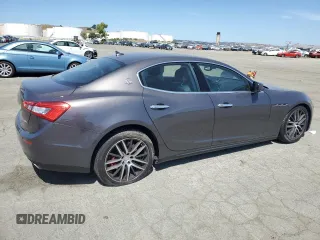 2016 Maserati Ghibli S with VIN ZAM57RSA3G1169053, listed as a Copart auction lot 58970355 with 73,843 mi miles and Salvage title. Bid and sale history available at DreamBid. Image 3.