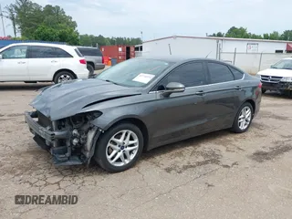 2016 Ford Fusion SE z VIN 3FA6P0H77GR367727, wystawiony jako IAAI lot #42274323 z przebiegiem 309 852 mil mil oraz . Historia ofert i sprzedaży dostępna na DreamBid. Obrazek 19.