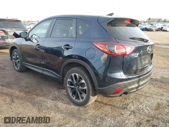 2016 Mazda CX-5 Grand Touring with VIN JM3KE4DY1G0823989, listed as a IAAI auction lot 41770149 with 40,677 mi miles. Bid and sale history available at carsss.com. Image 3.