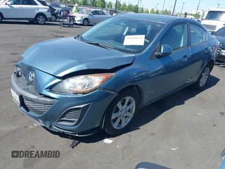 2011 Mazda 3 i Touring with VIN JM1BL1VG0B1498676, listed as a IAAI auction lot 42698676 with 111,719 mi miles and . Bid and sale history available at DreamBid. Image 2.