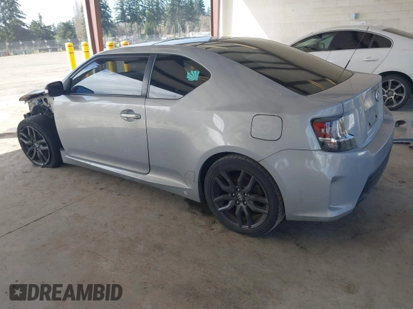 2014 Scion tC with VIN JTKJF5C71E3069593, listed as a IAAI auction lot 41901040 with 86,231 mi miles. Bid and sale history available at carsss.com. Image 3.