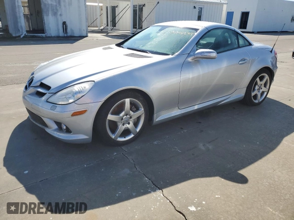 2005 Mercedes-Benz SLK-Class with VIN WDBWK56F65F030071, listed as a Copart auction lot 74048934 with 0 mi miles and Salvage Title. Bid and sale history available at carsss.com. Image 1.