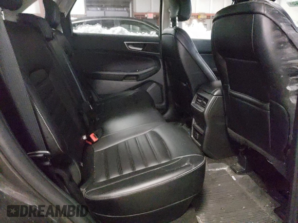 2019 Ford Edge SEL z VIN 2FMPK4J94KBB35458, wystawiony jako Copart lot #44383745 z przebiegiem 184 835 mil mil oraz Szkoda całkowita • Salvage title. Historia ofert i sprzedaży dostępna na DreamBid. Obrazek 11.