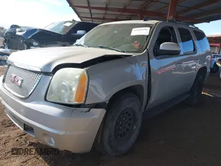 2007 GMC Yukon SLE with VIN 1GKFK13057J108533, listed as a IAAI auction lot 41364196 with 207,890 mi miles. Bid and sale history available at carsss.com. Image 2.