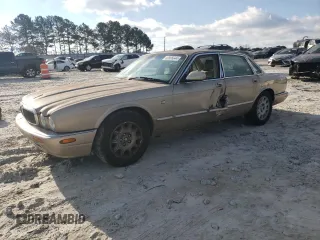 1998 Jaguar XJ with VIN SAJHX1242WC845736, listed as a Copart auction lot 82006044 with 188,785 mi miles and Salvage Title. Bid and sale history available at DreamBid. Image 1.