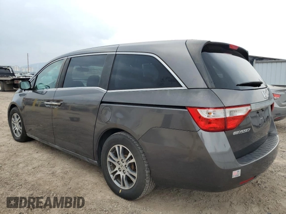 2013 Honda Odyssey EX-L with VIN 5FNRL5H68DB070079, listed as a Copart auction lot 52183895 with 173,428 mi miles and Clean title. Bid and sale history available at DreamBid. Image 2.