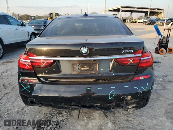 2018 BMW 7 Series 750i with VIN WBA7F0C5XJGM22674, listed as a Copart auction lot 74833524 with 0 mi miles and Salvage Title. Bid and sale history available at carsss.com. Image 6.