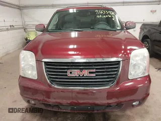 2011 GMC Yukon SLT with VIN 1GKS2CE08BR308792, listed as a IAAI auction lot 41633427 with 216,483 mi miles. Bid and sale history available at carsss.com. Image 12.