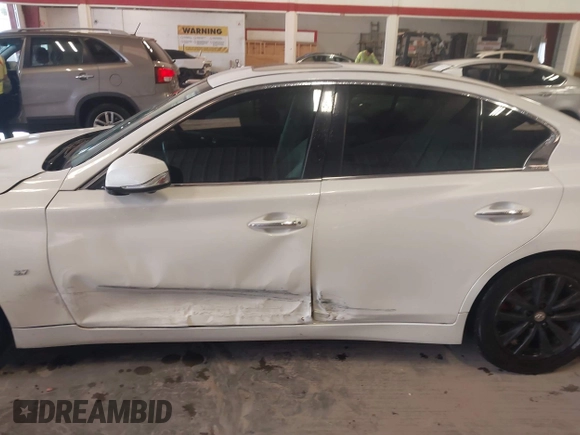 2015 Infiniti Q50 with VIN JN1BV7AP0FM347685, listed as a IAAI auction lot 42690285 with 126,957 mi miles and . Bid and sale history available at DreamBid. Image 14.