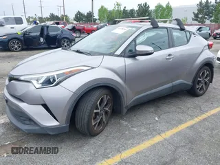 2018 Toyota C-HR XLE with VIN NMTKHMBX8JR032422, listed as a IAAI auction lot 42038240 with 132,553 mi miles and . Bid and sale history available at DreamBid. Image 22.