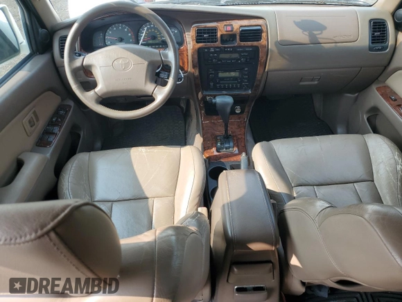 1999 Toyota 4Runner Limited с VIN JT3GN87R6X0098906, выставлен на аукционе Copart как лот 58648935 с пробегом 194 869 миль миль и Списание • Salvage title. История ставок и продаж доступна на DreamBid. Изображение 8.
