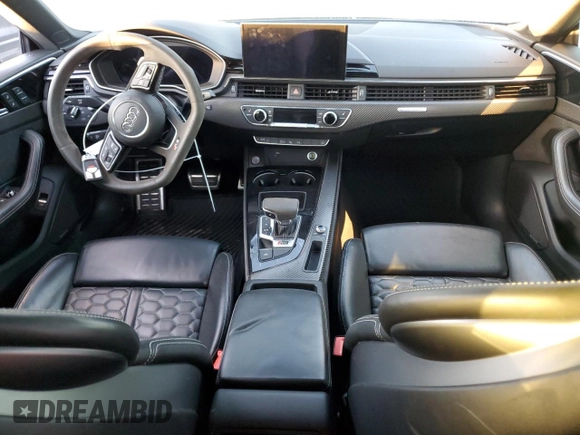 2021 Audi RS 5 Sportback z VIN WUAAWCF51MA901341, wystawiony jako Copart lot #76619034 z przebiegiem Nie podano mil oraz Szkoda całkowita • Salvage title. Historia ofert i sprzedaży dostępna na DreamBid. Obrazek 8.