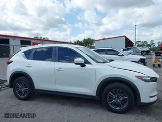 2020 Mazda CX-5 Touring with VIN JM3KFACM6L1820441, listed as a IAAI auction lot 41579634 with 55,416 mi miles. Bid and sale history available at carsss.com. Image 14.