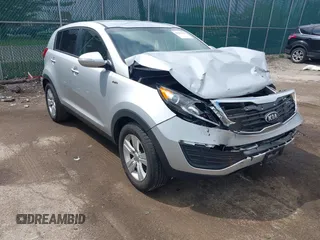 2013 Kia Sportage LX z VIN KNDPBCA27D7467259, wystawiony jako IAAI lot #42165726 z przebiegiem 116 185 mil mil oraz . Historia ofert i sprzedaży dostępna na DreamBid. Obrazek 1.