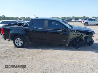 2018 Chevrolet Colorado 4WD LT z VIN 1GCGTCEN0J1265248, wystawiony jako IAAI lot #42247568 z przebiegiem 74 863 mil mil oraz . Historia ofert i sprzedaży dostępna na DreamBid. Obrazek 14.