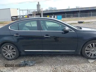 2015 Kia Cadenza Premium with VIN KNALN4D74F5188219, listed as a IAAI auction lot 41530800 with 144,330 mi miles. Bid and sale history available at carsss.com. Image 13.