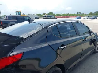 2014 Kia Optima LX z VIN 5XXGM4A77EG322243, wystawiony jako IAAI lot #42334987 z przebiegiem 141 068 mil mil oraz . Historia ofert i sprzedaży dostępna na DreamBid. Obrazek 15.