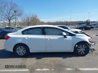 2012 Honda Civic LX with VIN 19XFB2F54CE348155, listed as a IAAI auction lot 42064540 with 238,636 mi miles and . Bid and sale history available at DreamBid. Image 13.