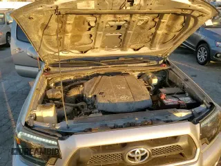 2014 Toyota Tacoma PreRunner with VIN 3TMKU4HNXEM041311, listed as a Copart auction lot 84065684 with 212,473 mi miles and Salvage title. Bid and sale history available at DreamBid. Image 13.