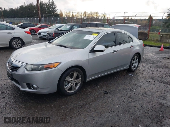 2012 Acura TSX Tech Pkg with VIN JH4CU2F62CC012290, listed as a IAAI auction lot 40765338 with 129,737 mi miles. Bid and sale history available at carsss.com. Image 17.