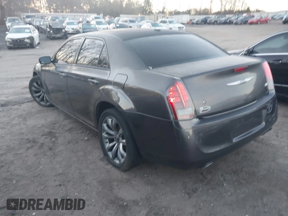 2014 Chrysler 300 S with VIN 2C3CCABG2EH352220, listed as a IAAI auction lot 41796284 with 127,070 mi miles and . Bid and sale history available at DreamBid. Image 3.