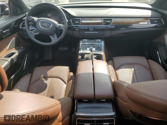 2011 Audi A8 z VIN WAURVAFD9BN005595, wystawiony jako Copart lot #66302644 z przebiegiem 106 610 mil mil oraz Nie do naprawy. Historia ofert i sprzedaży dostępna na DreamBid. Obrazek 8.