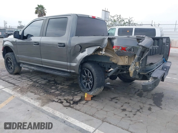 2018 Ford F-150 XL with VIN 1FTEW1EP4JKD45070, listed as a IAAI auction lot 42648874 with 140,424 mi miles and . Bid and sale history available at DreamBid. Image 3.